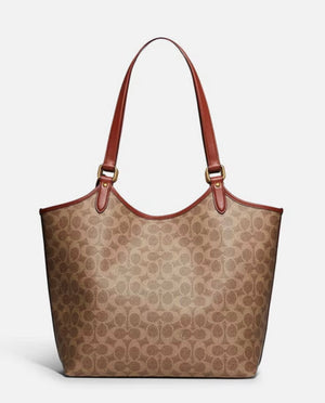 Coach Day Tote Bag in Signature Coated Canvas..