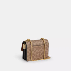 Coach Mini Klare Crossbody Bag In Signature Canvas Tan Black - Image 2