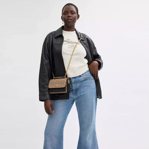 Coach Mini Klare Crossbody Bag In Signature Canvas Tan Black - Image 5