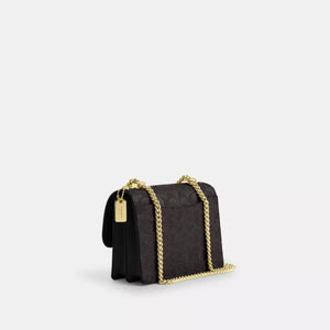 Coach Mini Klare Crossbody Bag In Signature Canvas Walnut Black - Image 2