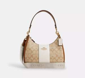Teri Hobo Bag in Signature Canvas with Stripe - original Coach - Dazz
