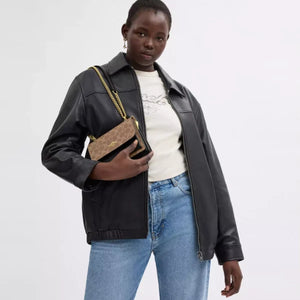 Coach Mini Klare Crossbody Bag In Signature Canvas Tan Black - Image 6