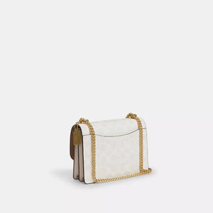 Coach Mini Klare Crossbody Bag In Signature Canvas White Chalk - Image 2